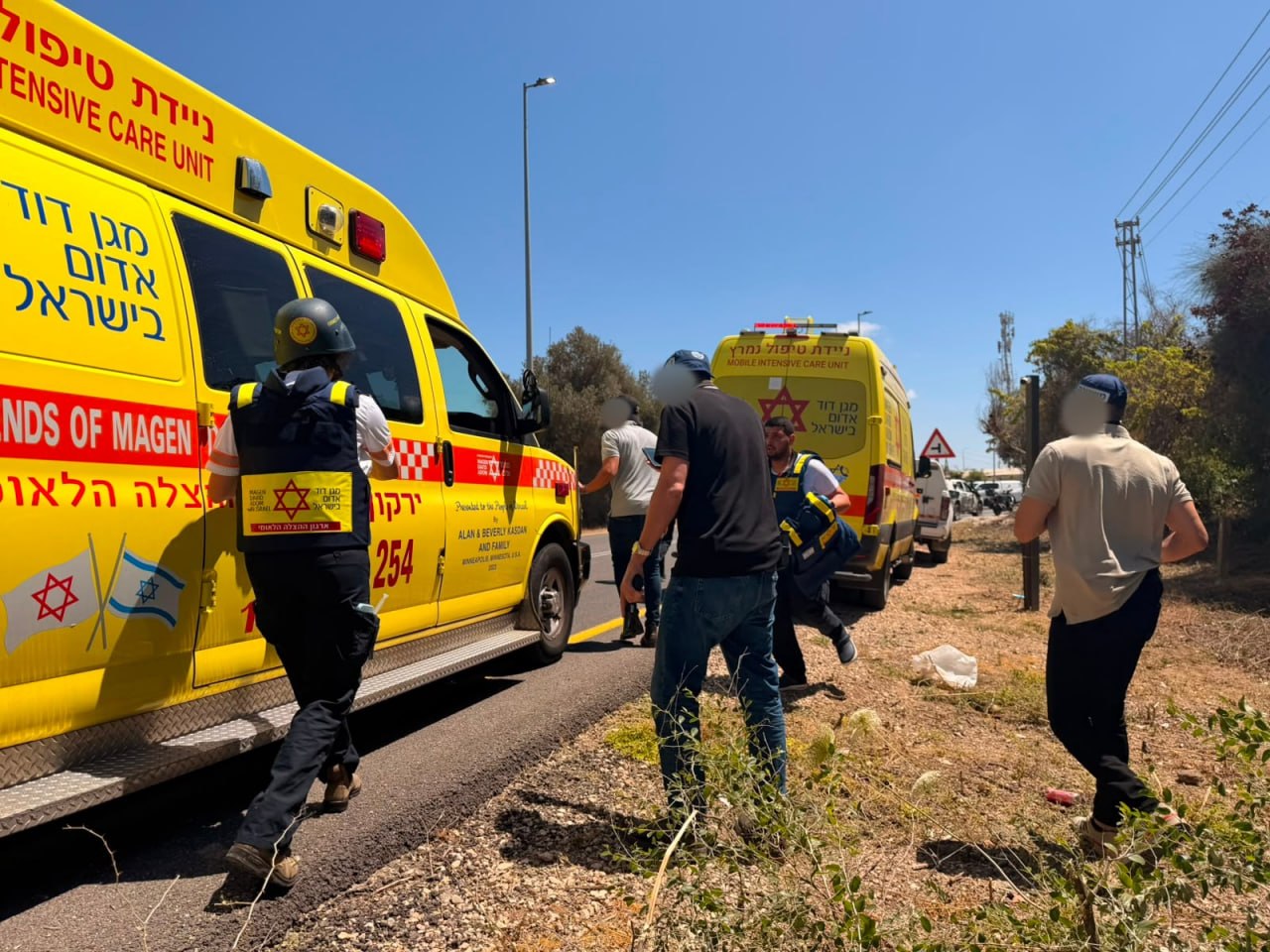 Magen David Adom emergency vehicles at Kochav Yair shooting scene central Israel