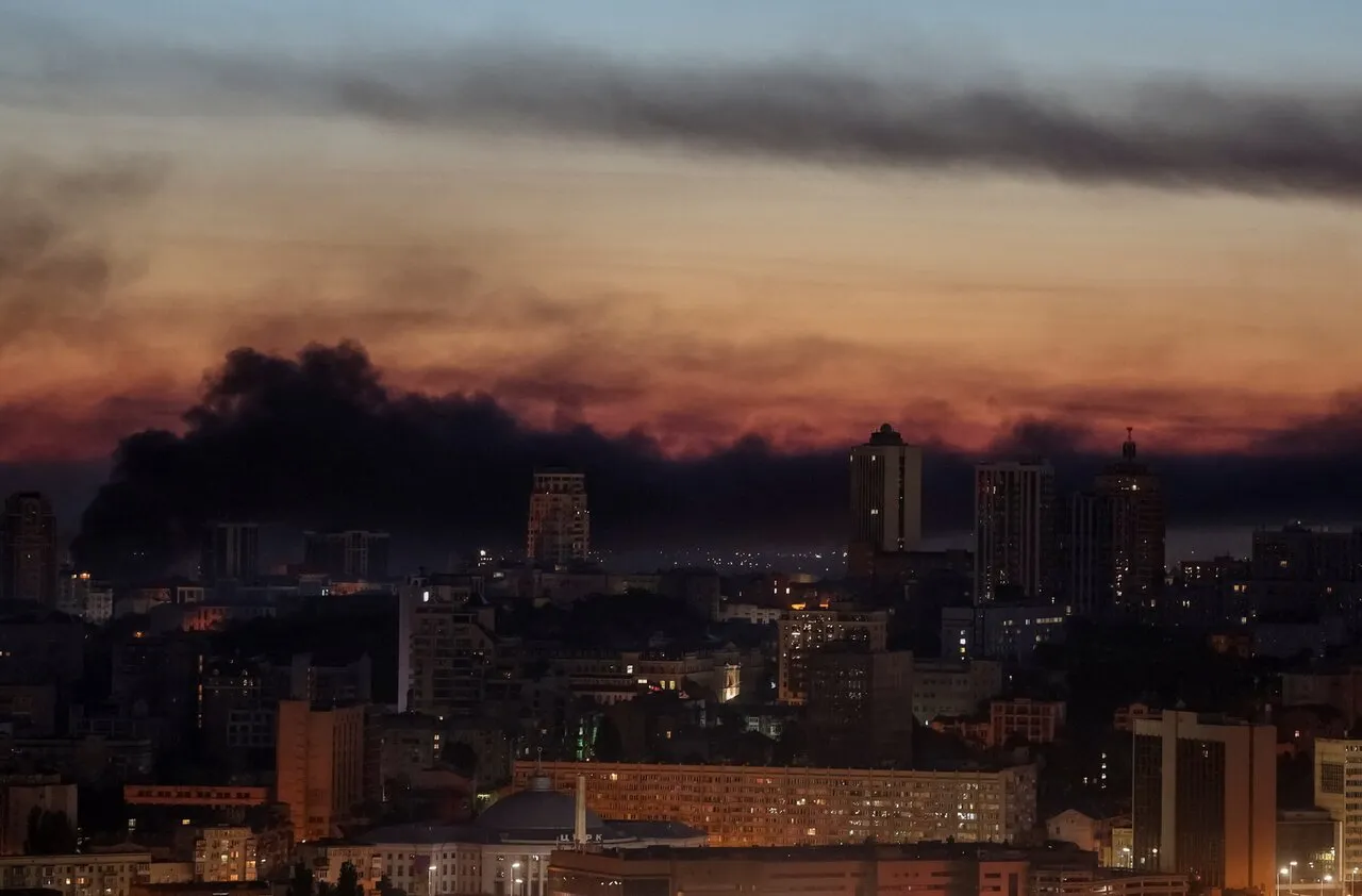 Smoke billows over Kyiv apartment buildings after Russian missile and drone strike June 2 2026