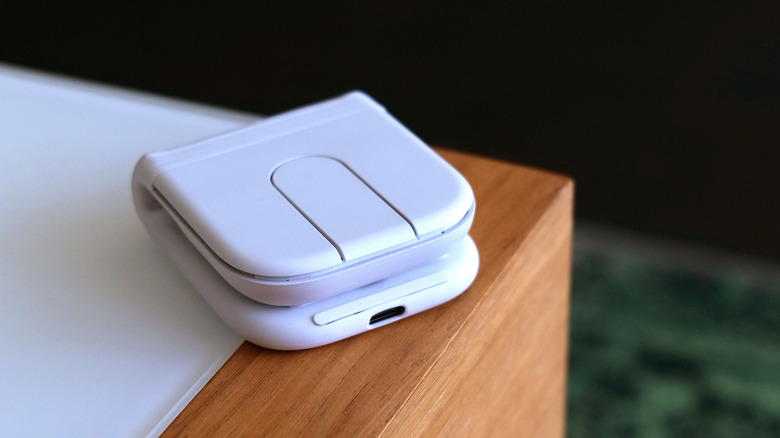 Logitech Mobi Fold mouse folded in half showing compact travel size