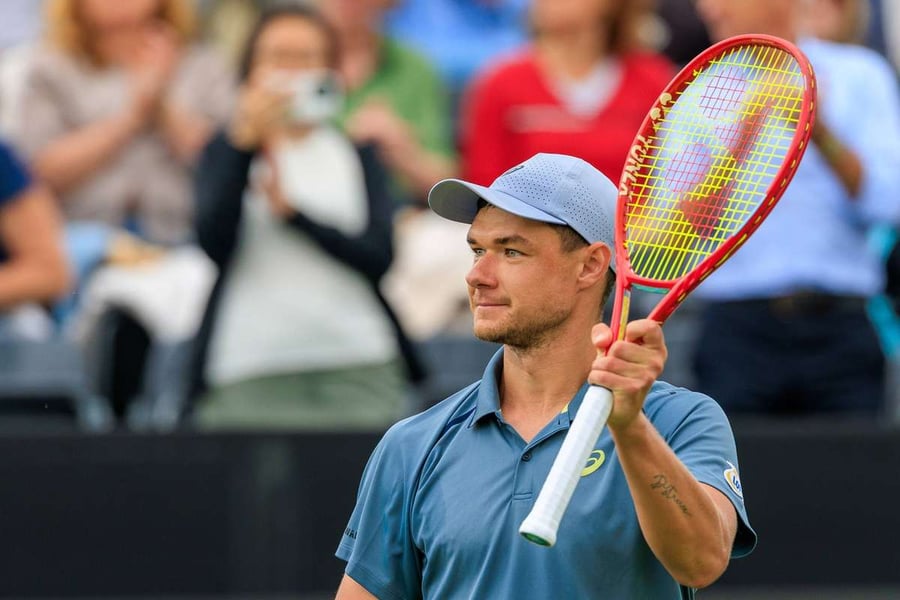 Kamil Majchrzak in action against Daniil Medvedev at the Libema Open semi-final in 's-Hertogenbosch