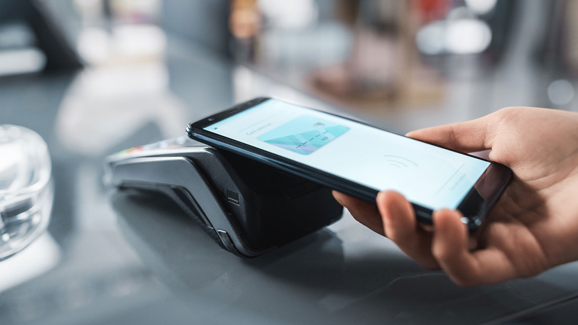 Person reviewing phone privacy settings and app permissions on a smartphone in 2026