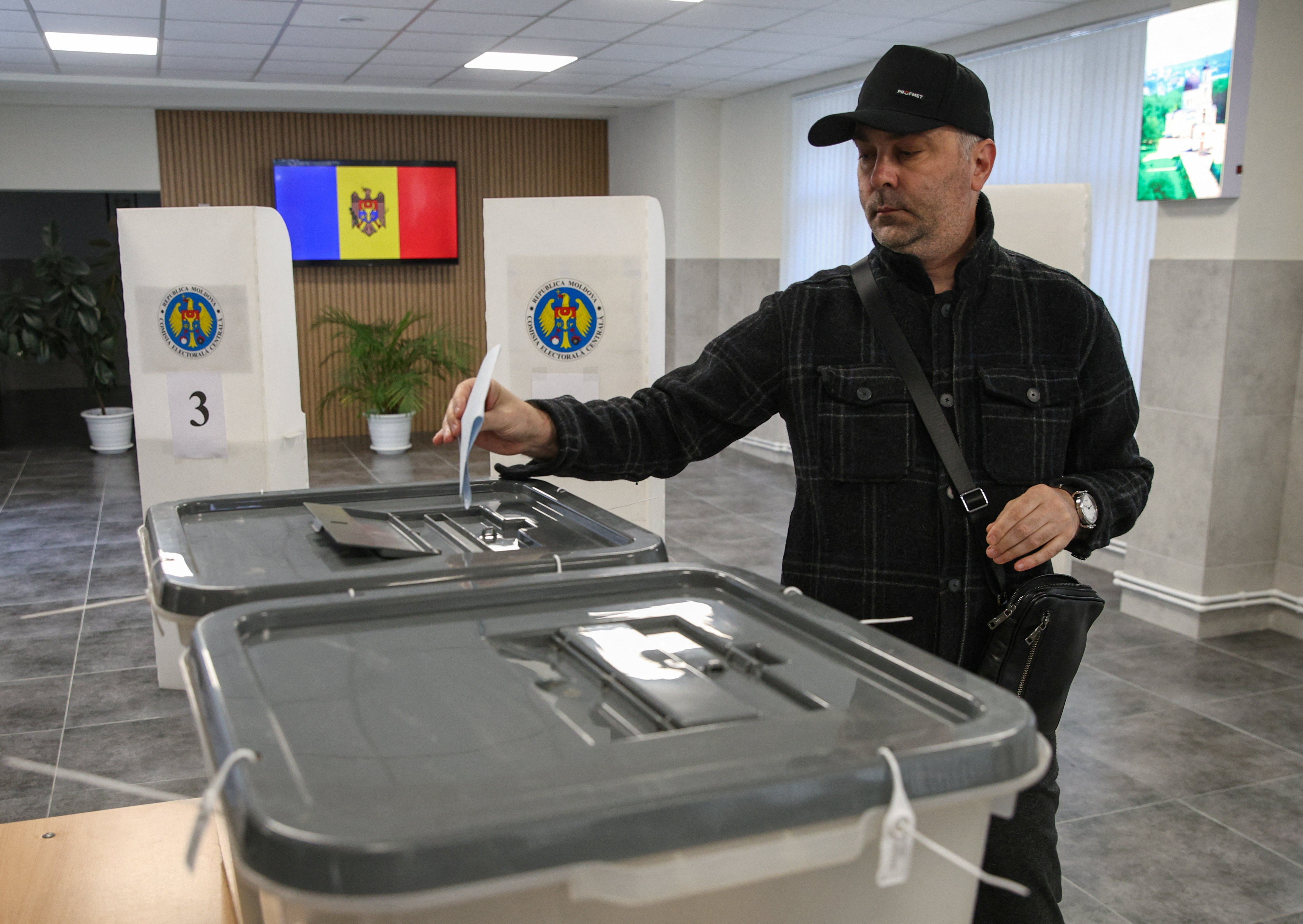 Moldovan voters at a polling station in Chisinau during the September 2025 parliamentary elections