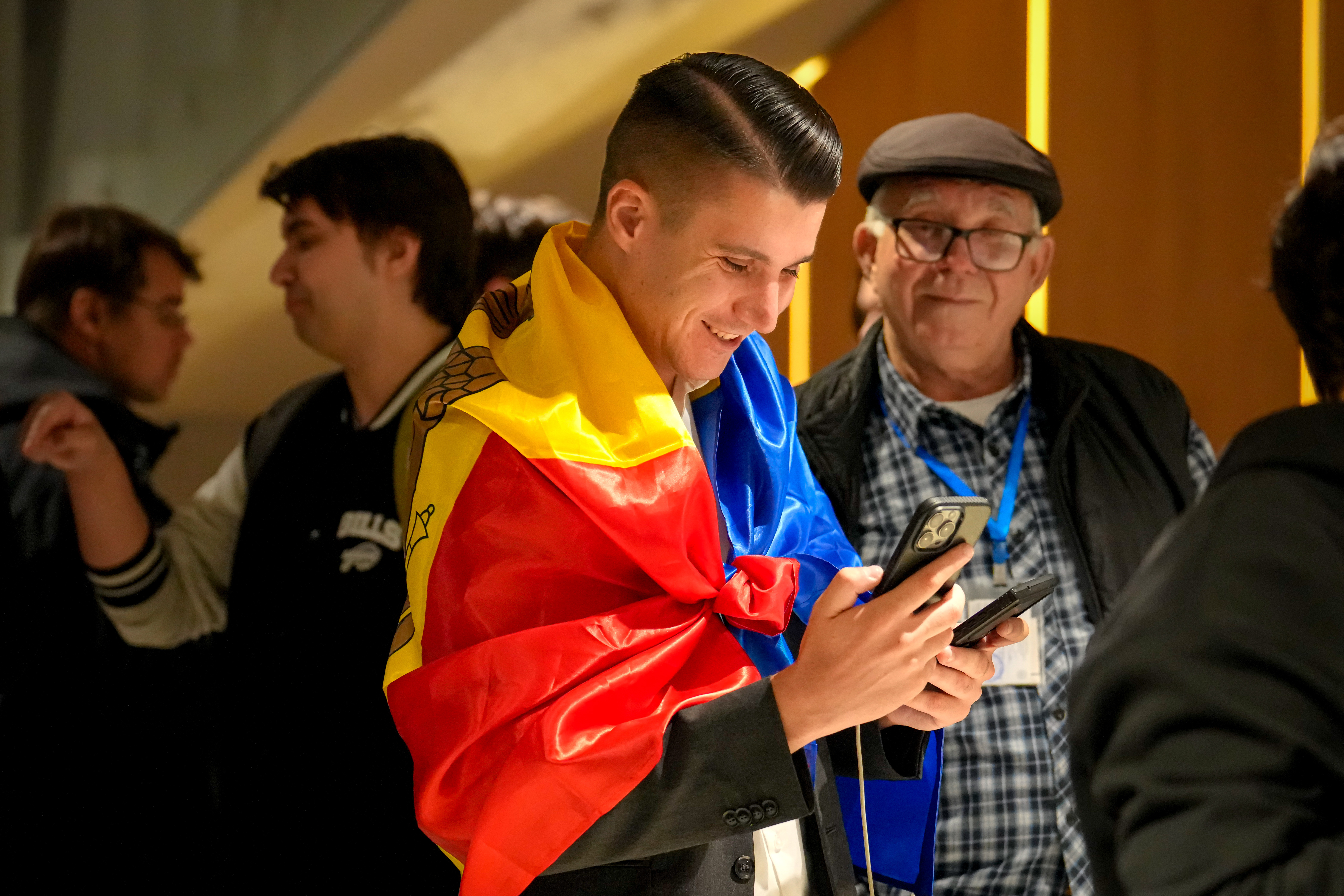 A voter at a polling station in Chisinau during Moldova's parliamentary elections, September 2025