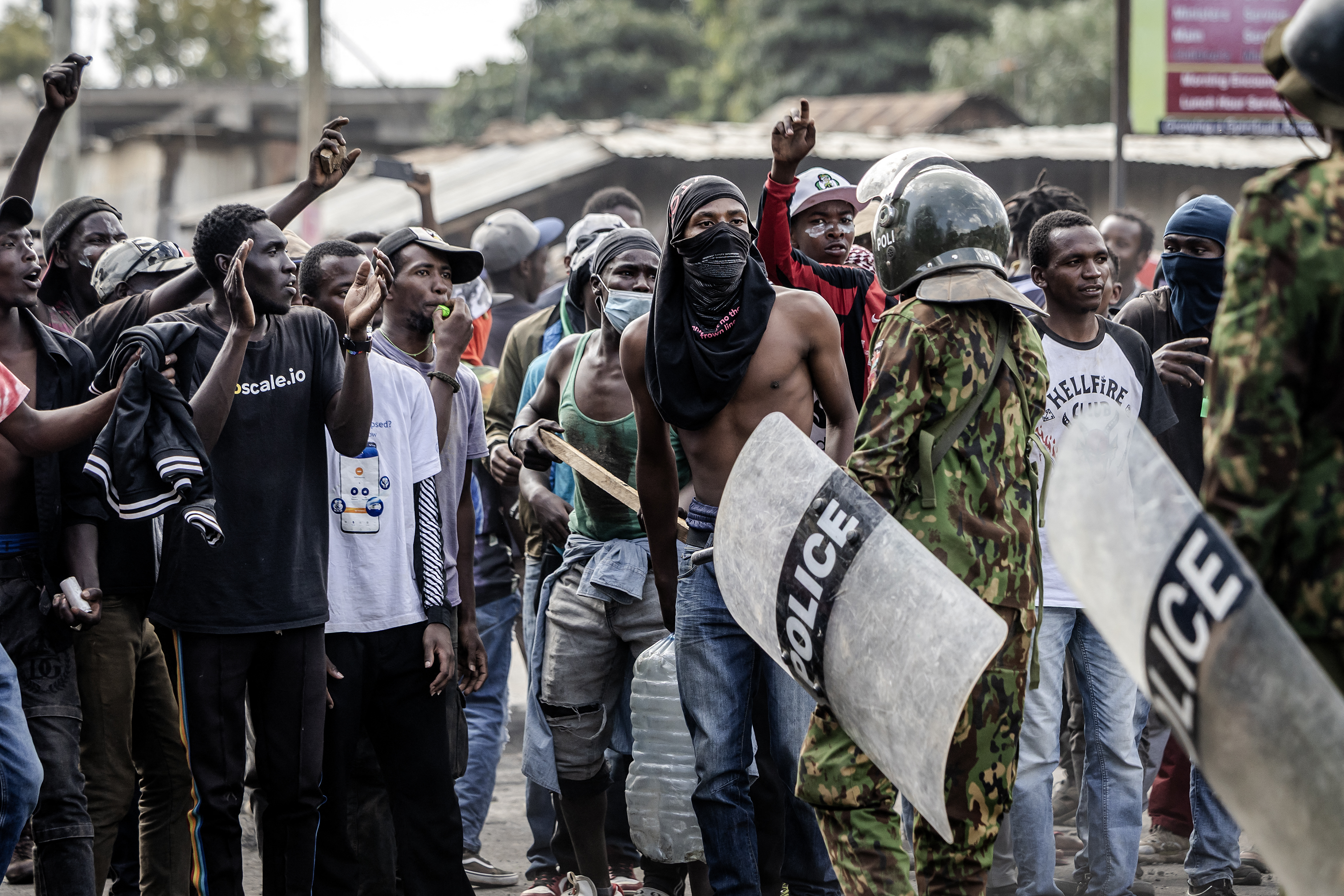 Demonstrators confront Kenyan police during the protest against the US Ebola quarantine centre in Nanyuki