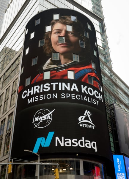 The Nasdaq MarketSite tower in Times Square displaying a closing bell ceremony on its screens