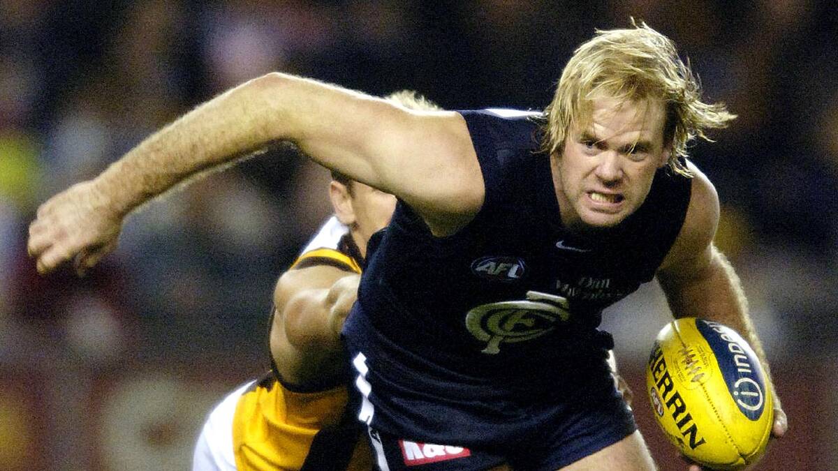 Nick Stevens playing AFL football for Port Adelaide and Carlton across his 231-game career