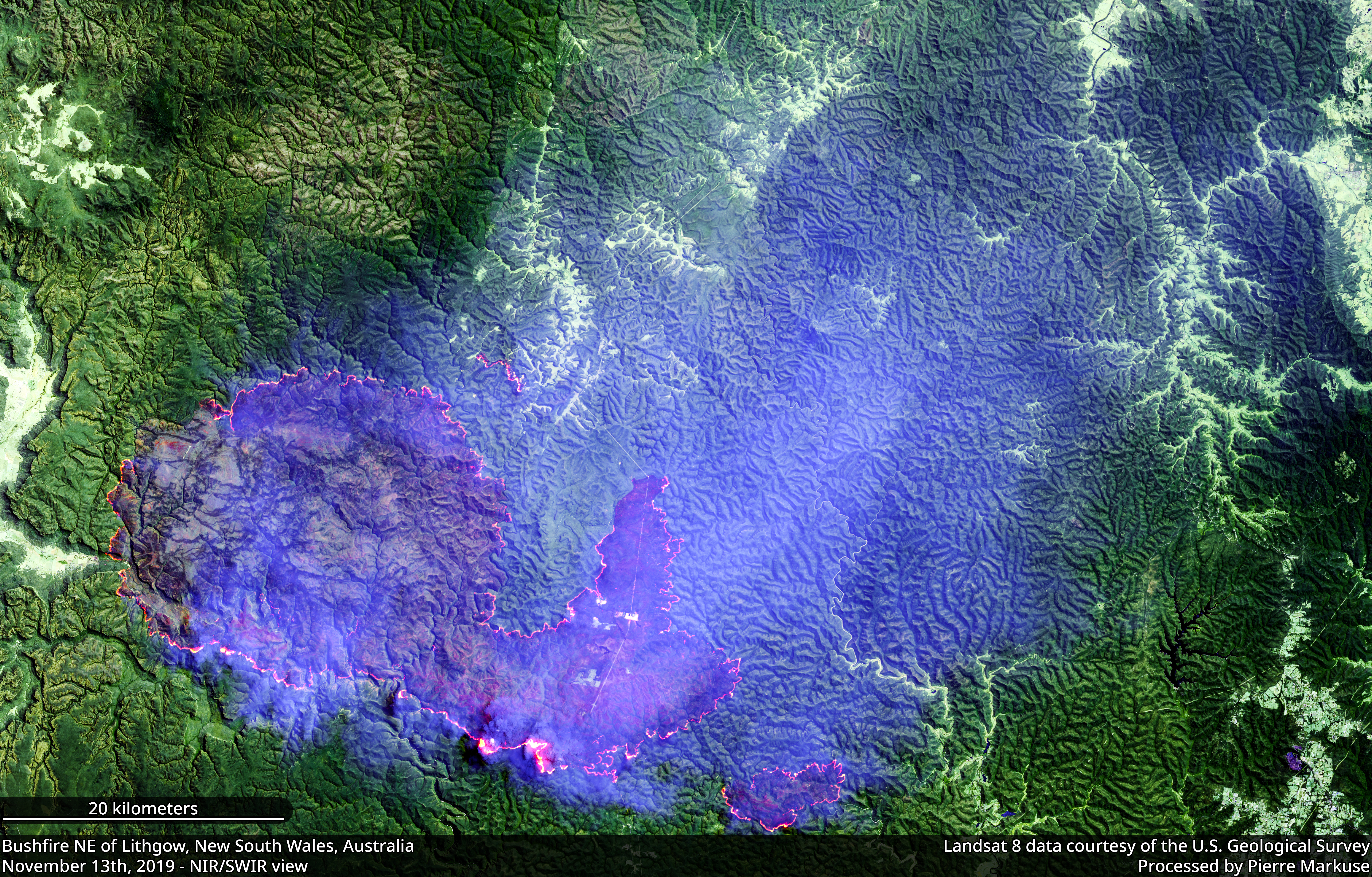 Satellite view of a bushfire burning northwest of Lithgow, New South Wales, with smoke streaming across the landscape