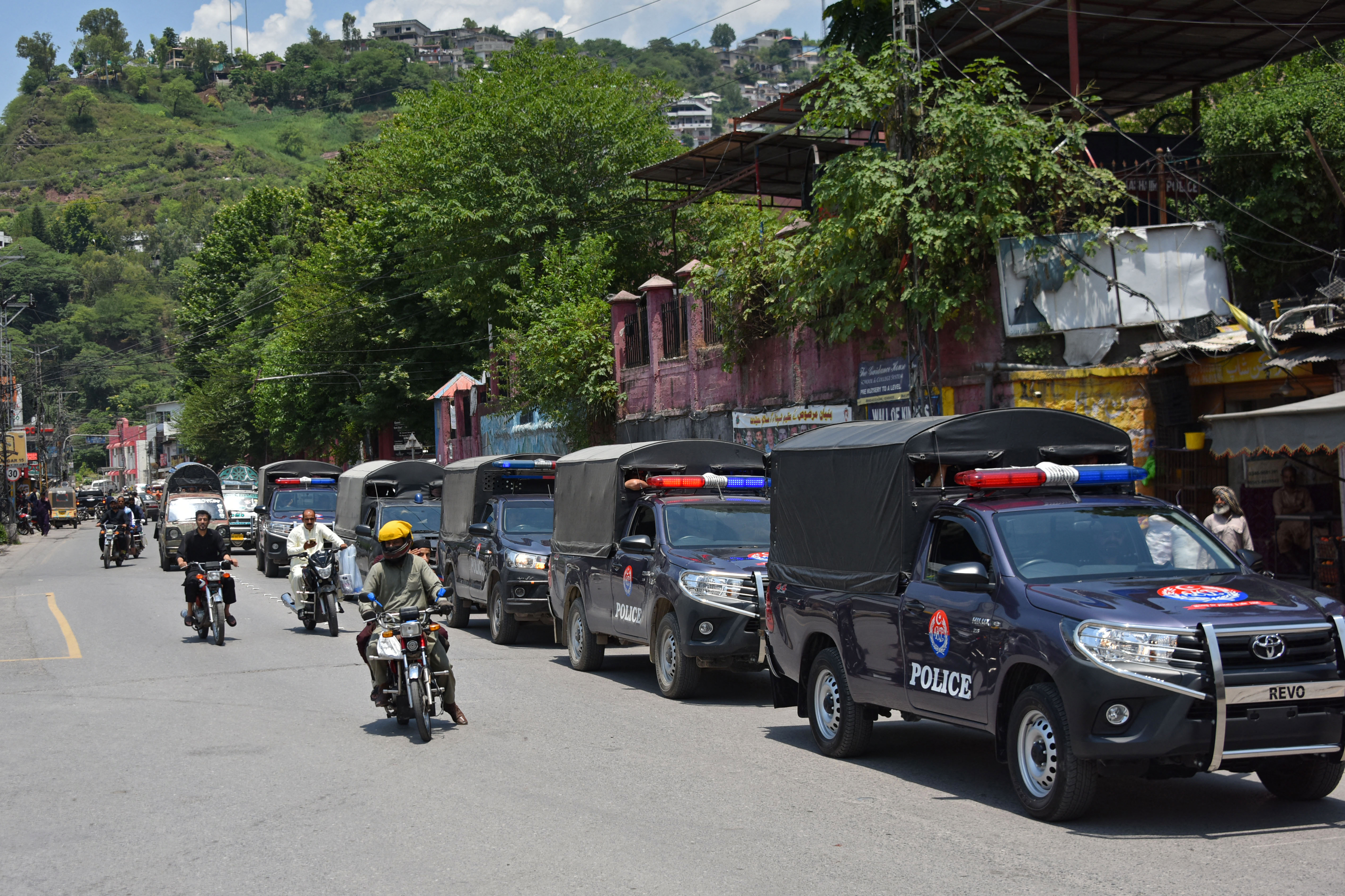 Security personnel patrol a street in Muzaffarabad, capital of Pakistan-administered Kashmir, before the Joint Awami Action Committee protest