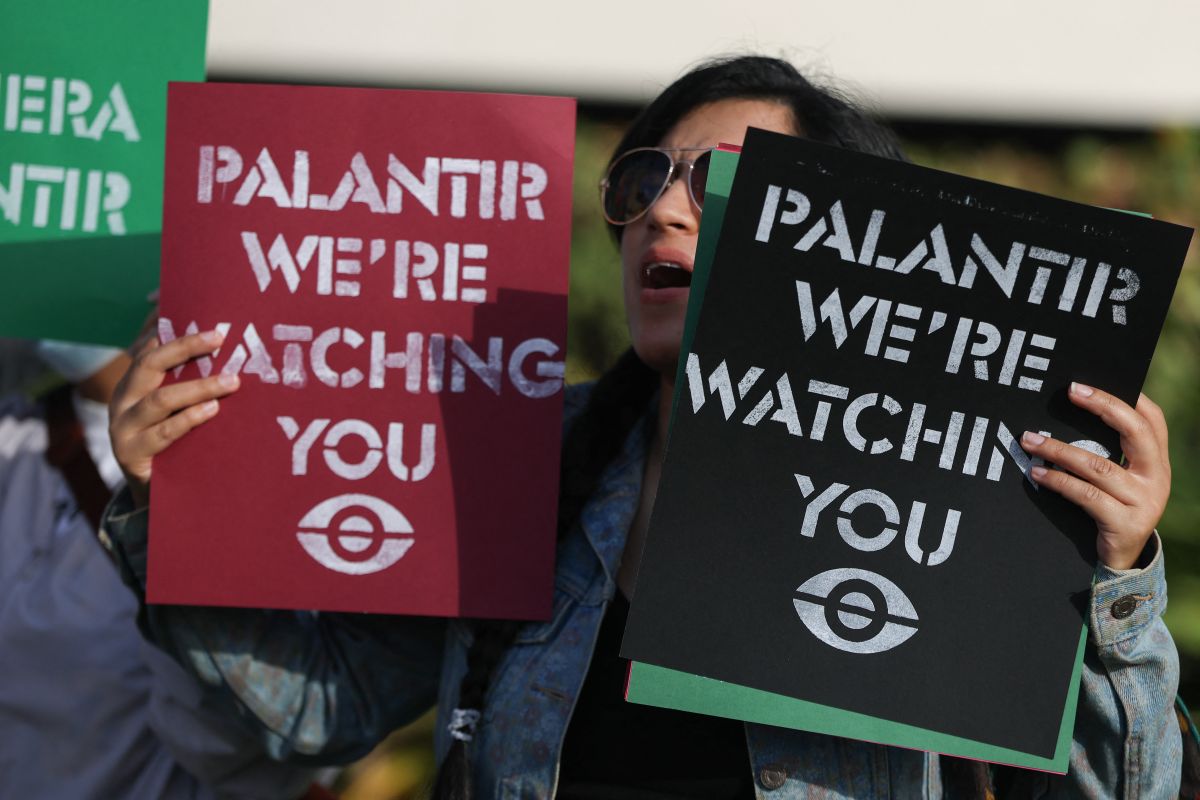 Protesters demonstrate against the surveillance firm Palantir outside its US headquarters
