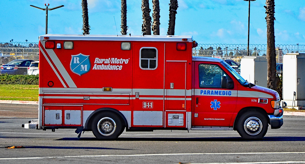 Paramedics and an ambulance, illustrating emergency overdose response