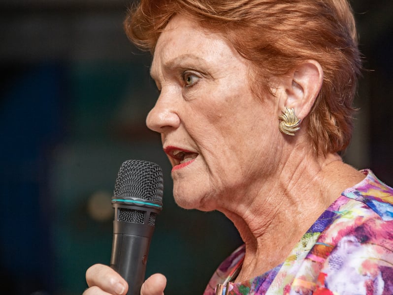 One Nation leader Pauline Hanson speaks into a microphone at a party campaign launch