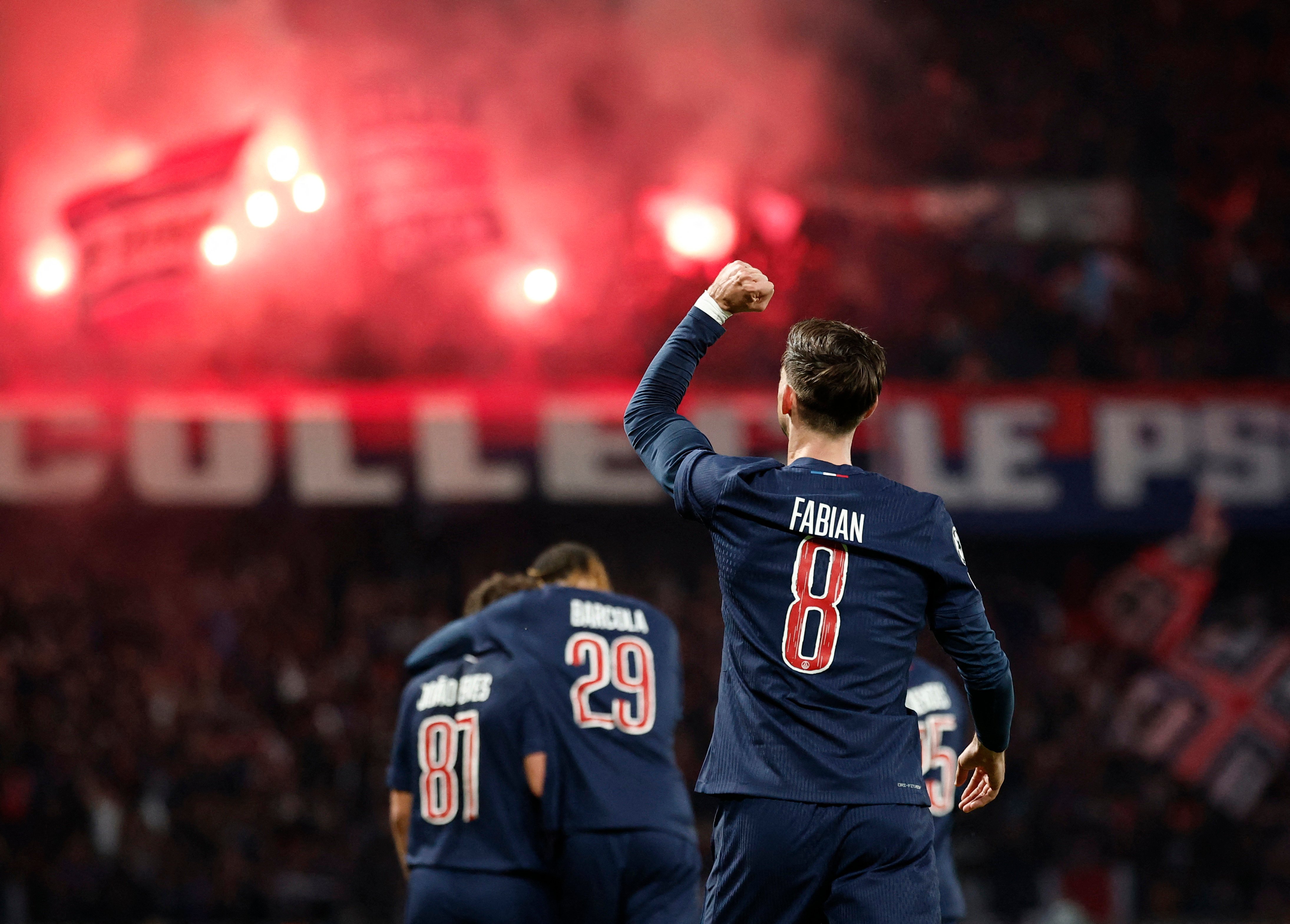 PSG players celebrate during the Champions League semifinal against Arsenal at Parc des Princes