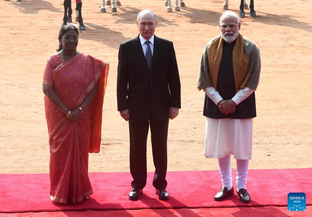 Russian President Vladimir Putin, Indian President Droupadi Murmu and Indian Prime Minister Narendra Modi pose for a group photo during a welcome ceremony in New Delhi, India, December 5, 2025