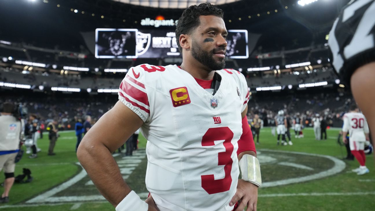 Russell Wilson drops back to pass during his Seattle Seahawks years