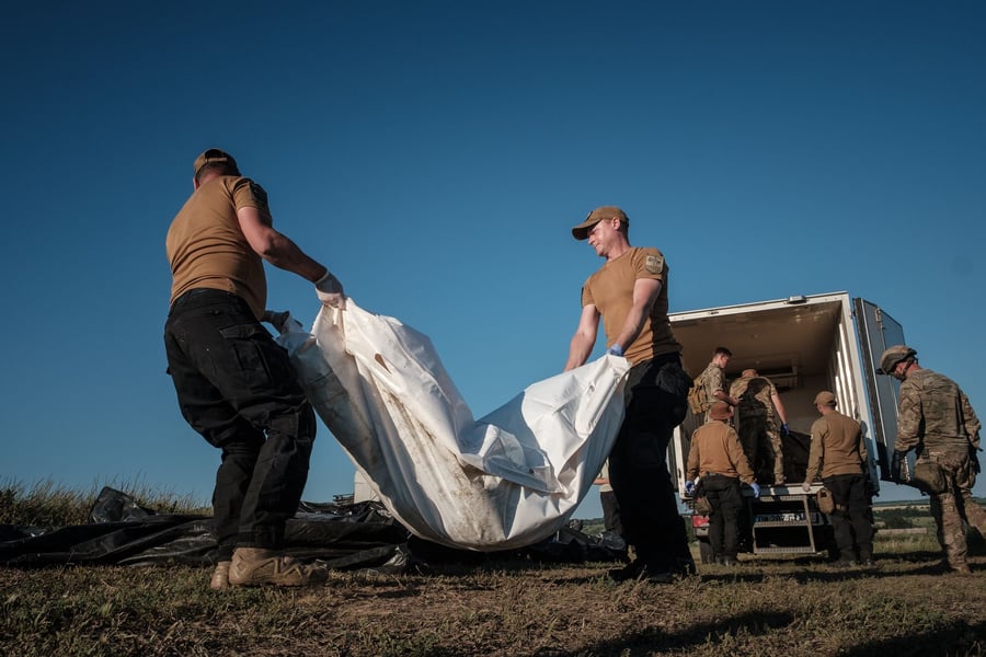 Volunteers identify remains of Russian soldiers Donetsk Oblast Ukraine
