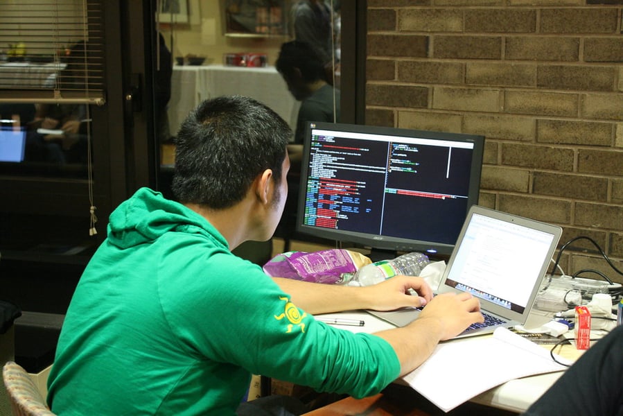 Developers coding, illustrating AI model development