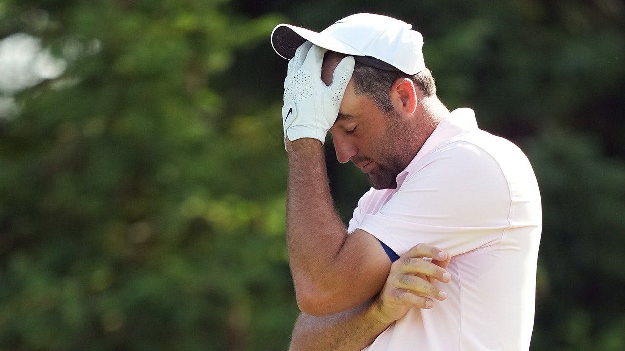 Scottie Scheffler reacts to his tee shot on the 16th hole during the first round of the 2026 Memorial Tournament at Muirfield Village