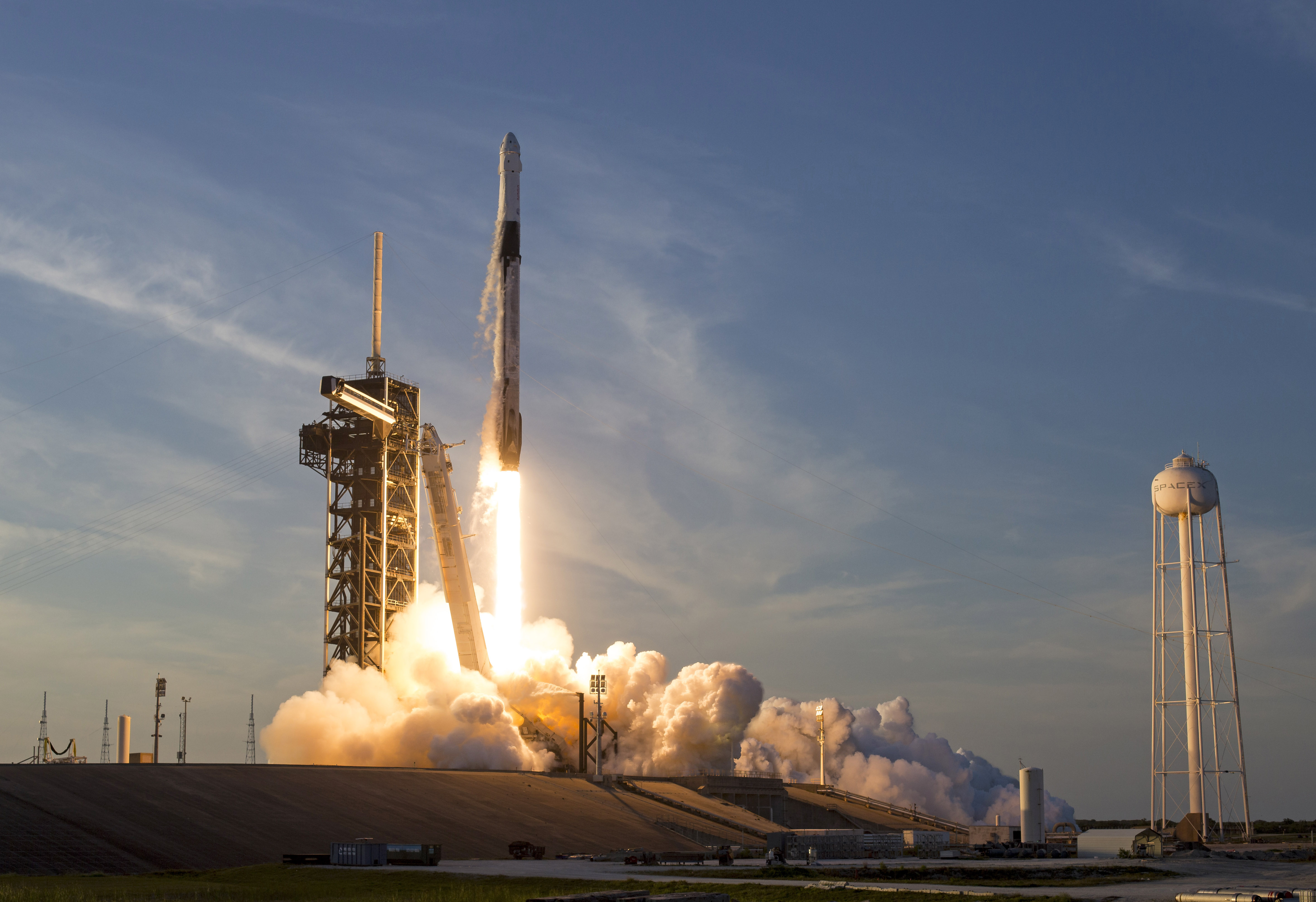 SpaceX Falcon 9 rocket lifting off from Kennedy Space Center ahead of the company's record Nasdaq IPO