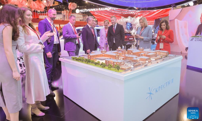 Delegates visit the exhibition hall at the 29th St. Petersburg International Economic Forum June 2026