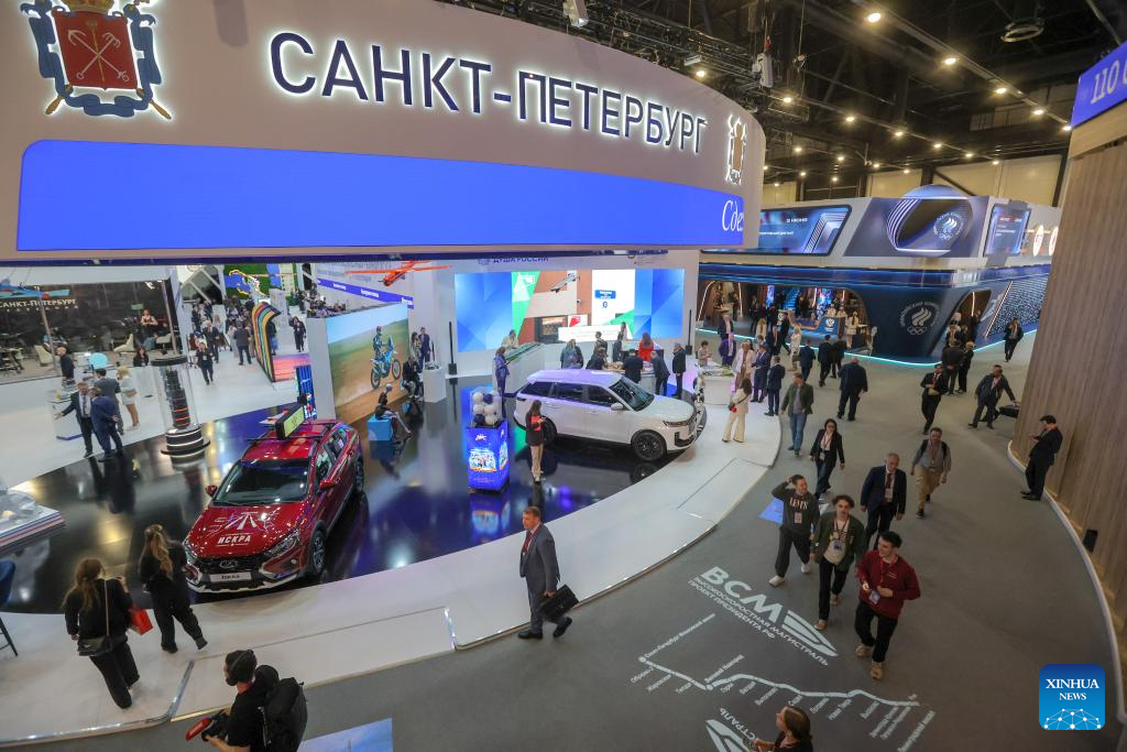 Delegates visiting the exhibition hall at SPIEF 2026 in St. Petersburg, Russia