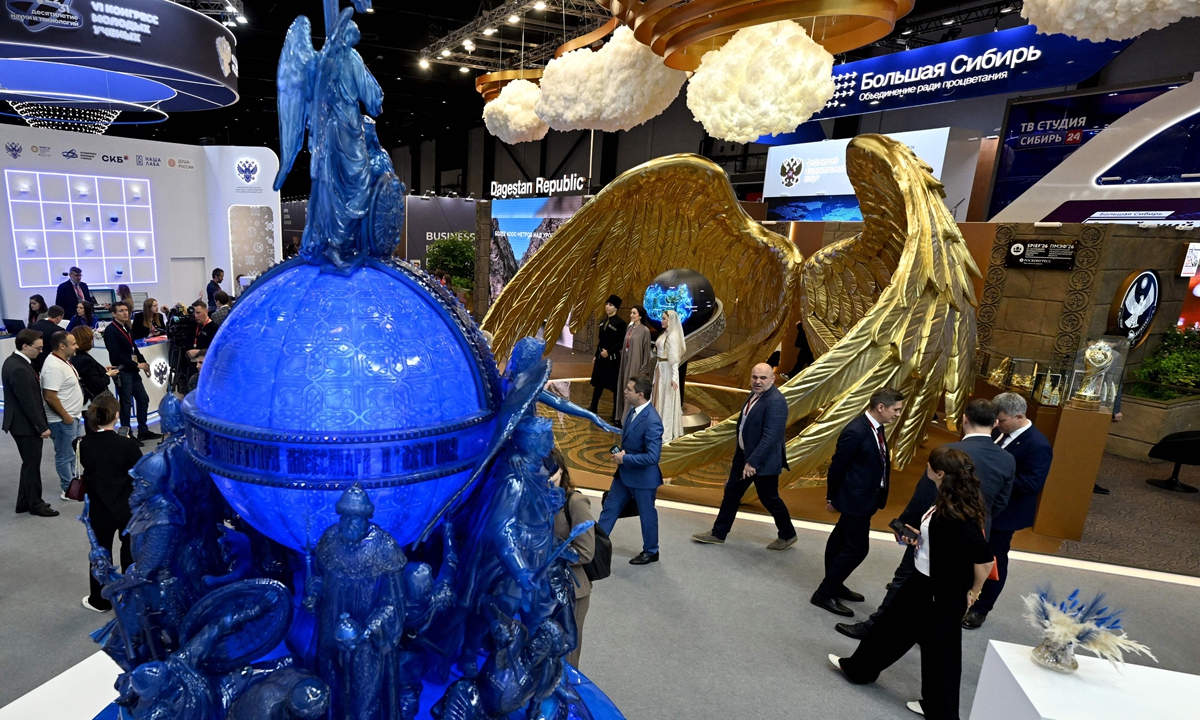 Participants visit the exhibition hall at the 29th St. Petersburg International Economic Forum (SPIEF) in Russia on June 3, 2026