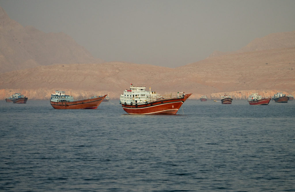 Cargo vessels at the Strait of Hormuz as seen from Musandam Oman on the day the US-Iran deal was announced June 14 2026