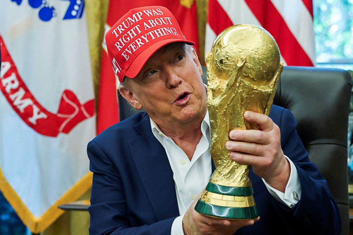 US President Donald Trump holds the FIFA World Cup trophy at the White House