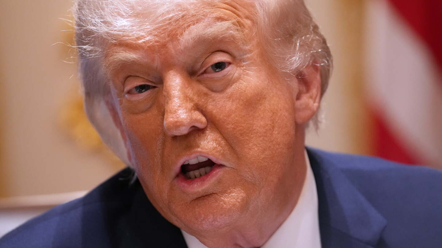 President Donald Trump speaks with reporters aboard Air Force One en route to Chippewa Falls Wisconsin June 5 2026