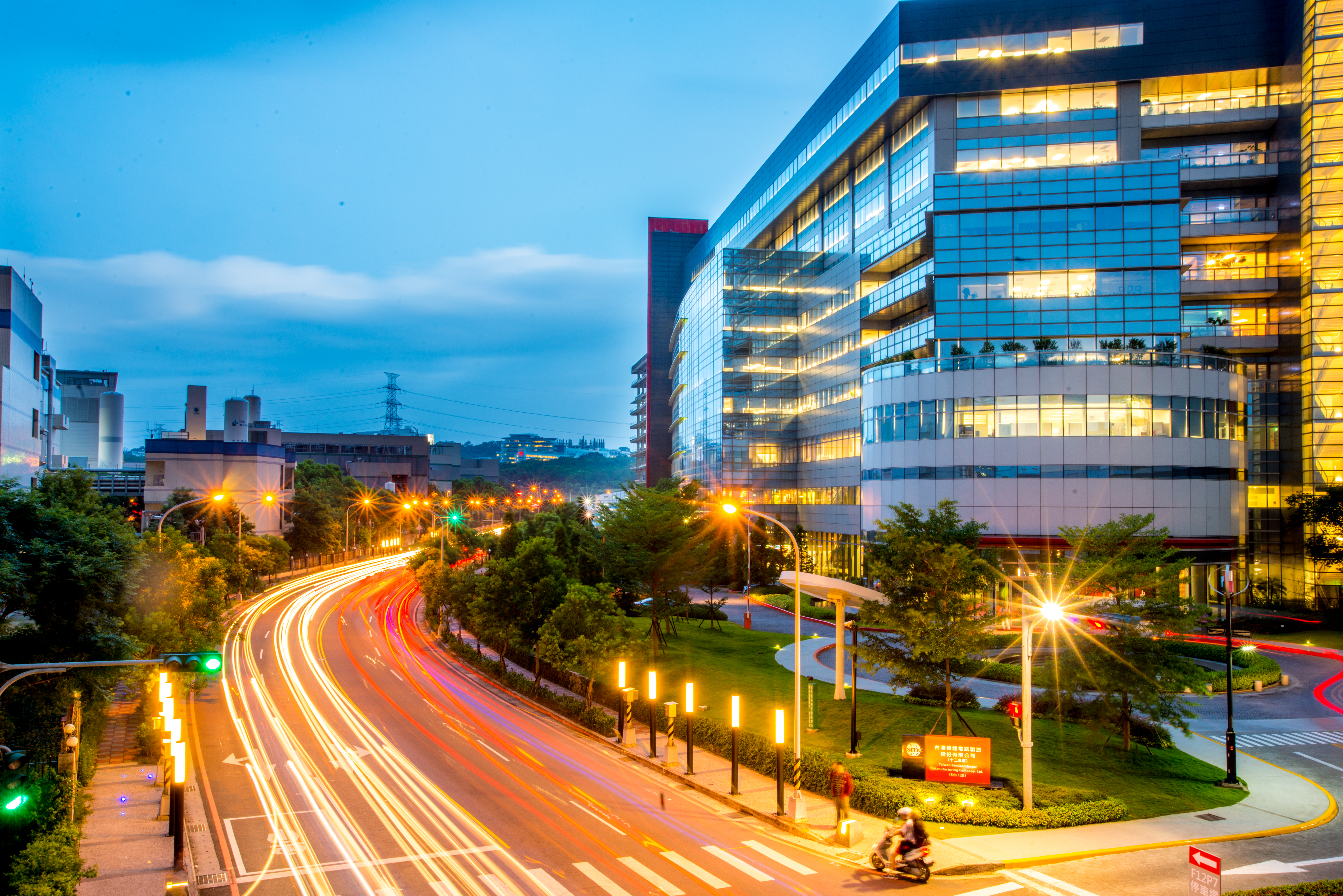 TSMC's Fab 12B plant at dusk in Taiwan, center of the global advanced chip supply that Washington wants replicated in Arizona