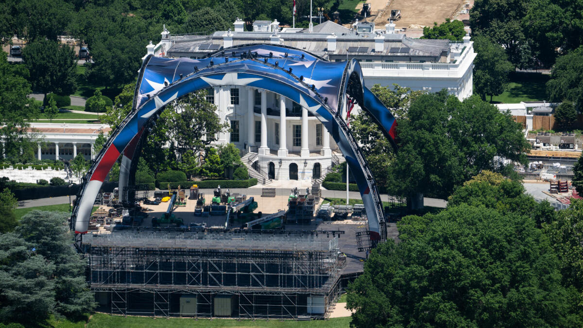 Construction crews building the UFC octagon on the White House South Lawn for UFC Freedom 250 June 14 2026