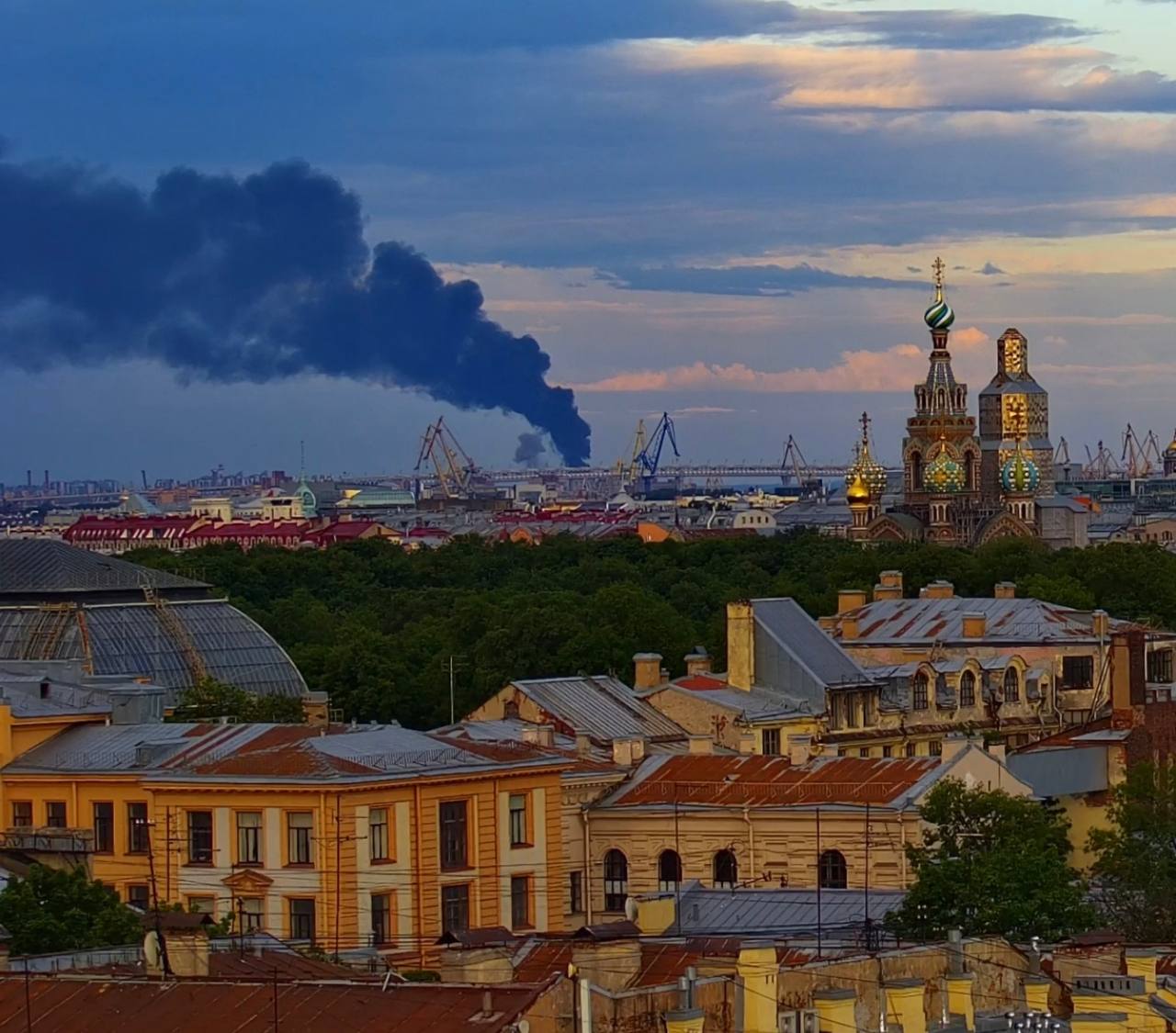 Black smoke rises over St. Petersburg after Ukrainian drone strikes hit the oil terminal on SPIEF opening day