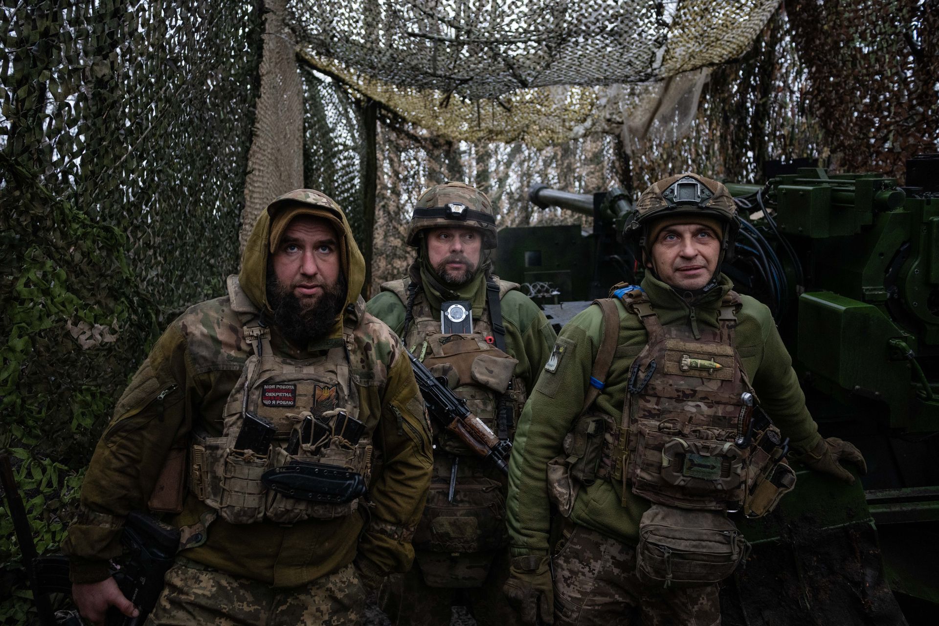 Ukrainian soldier from 148th Artillery Brigade walks along trench at Pokrovsk front-line position Donetsk Oblast January 2026 as Russia seizes Khimik DPR