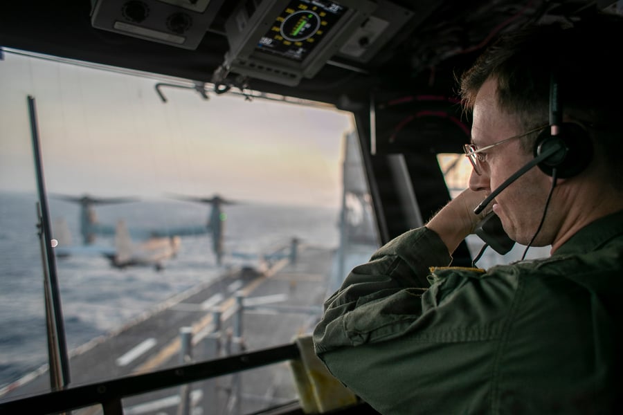 Flight operations aboard USS Tripoli during US Navy operations in the Gulf, where strikes on tankers have killed three Indian sailors