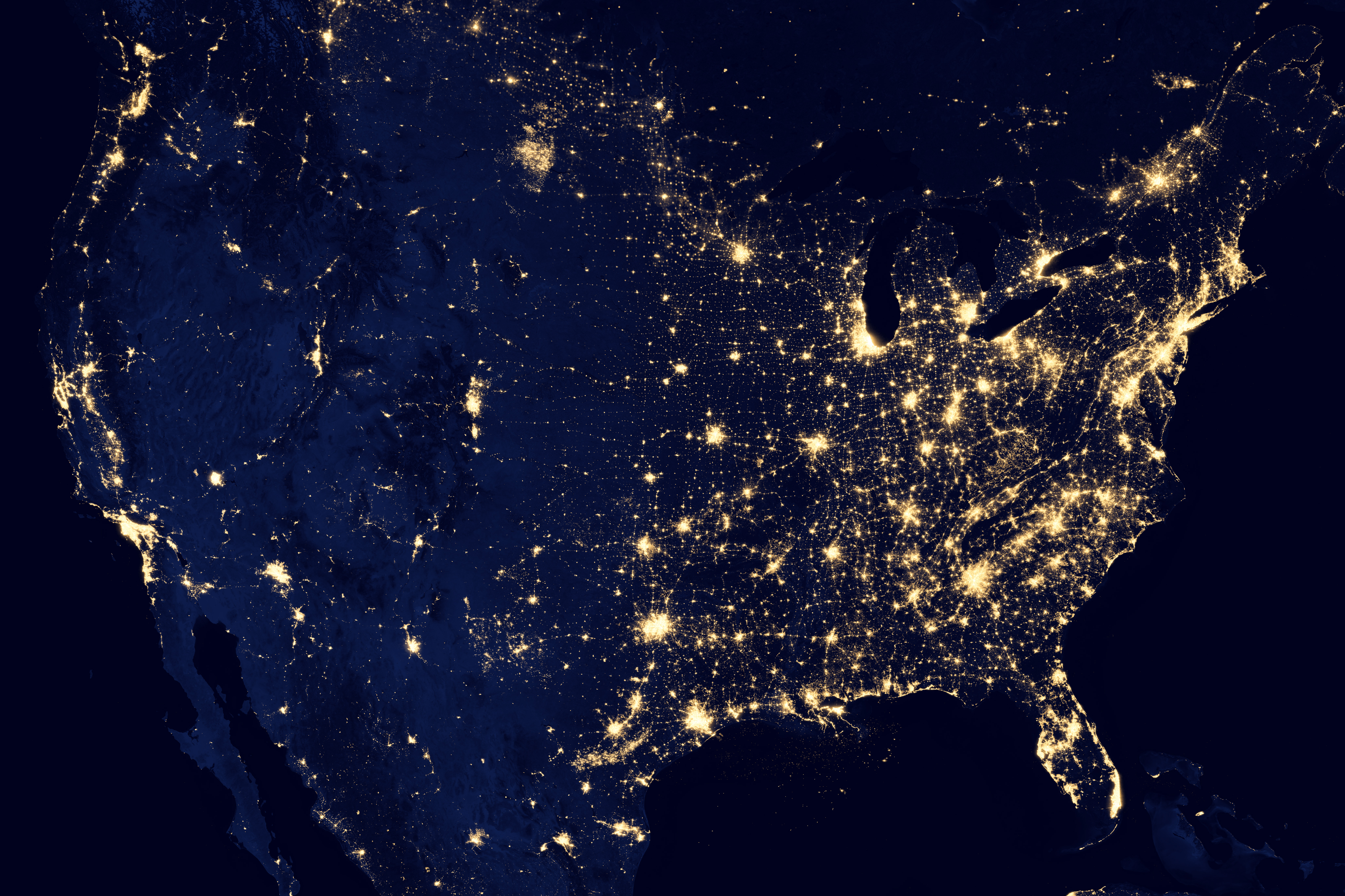 NASA Suomi NPP VIIRS composite map of US nighttime lights showing dense illumination across Northeast and Mid-Atlantic