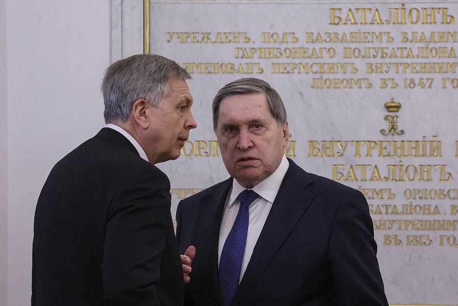 Kremlin aide Yury Ushakov speaks to reporters in Moscow.