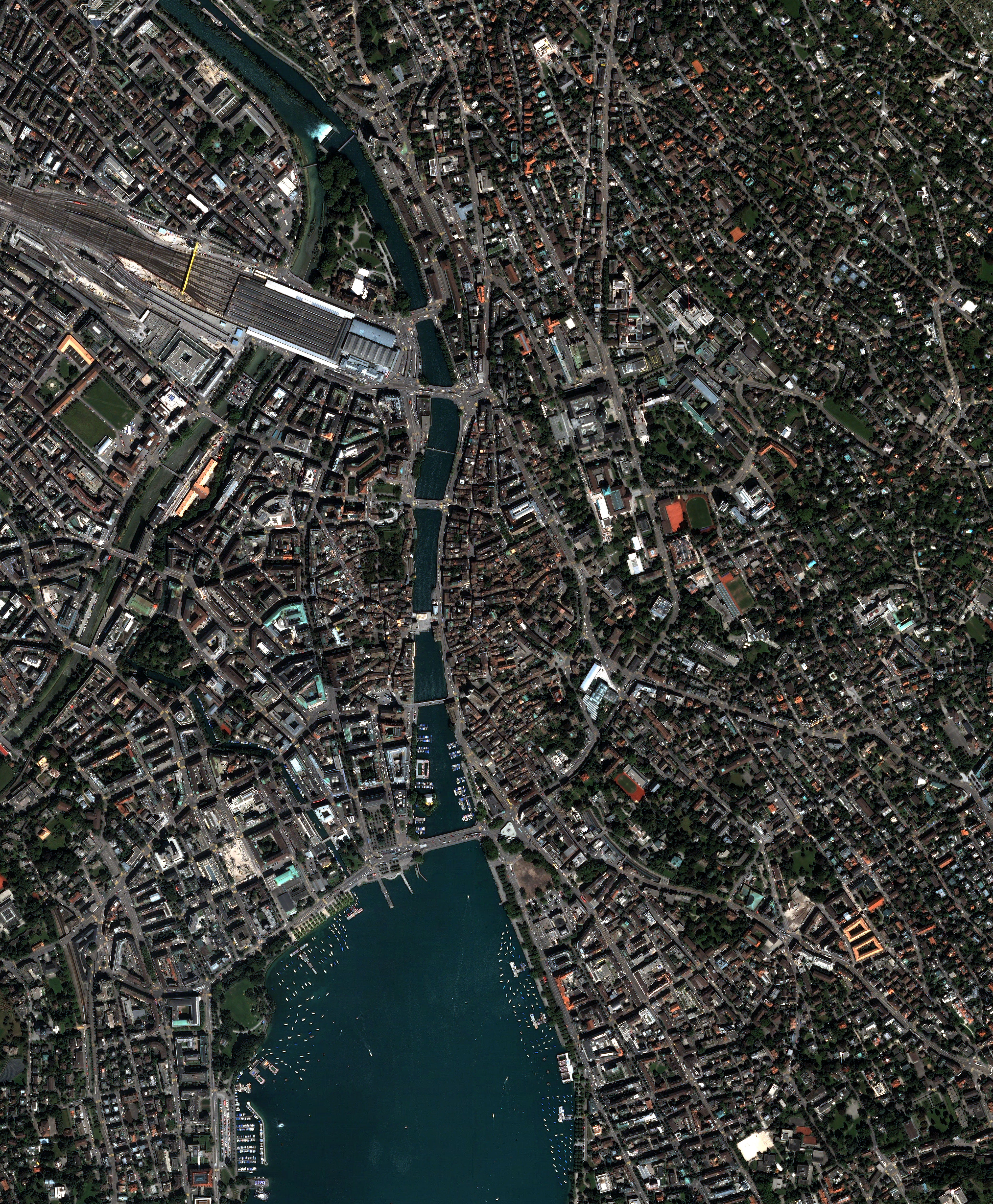 NASA Quickbird satellite high-resolution image of downtown Zurich Switzerland showing the city centre along Lake Zurich with the Limmat River and the Bahnhofstrasse commercial district