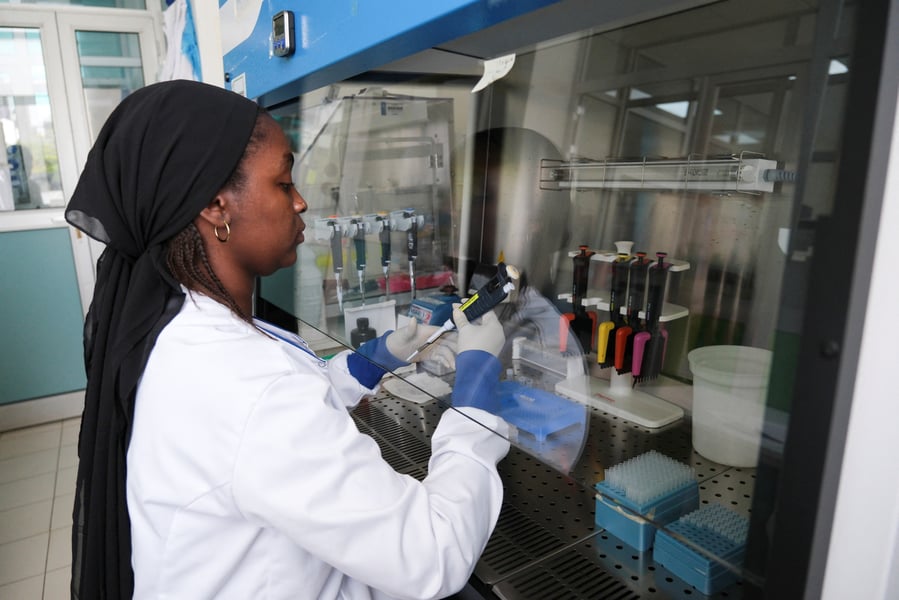 Researcher working in a laboratory in Dakar Senegal where the Andes hantavirus genome from the MV Hondius cruise ship outbreak was sequenced in May 2026