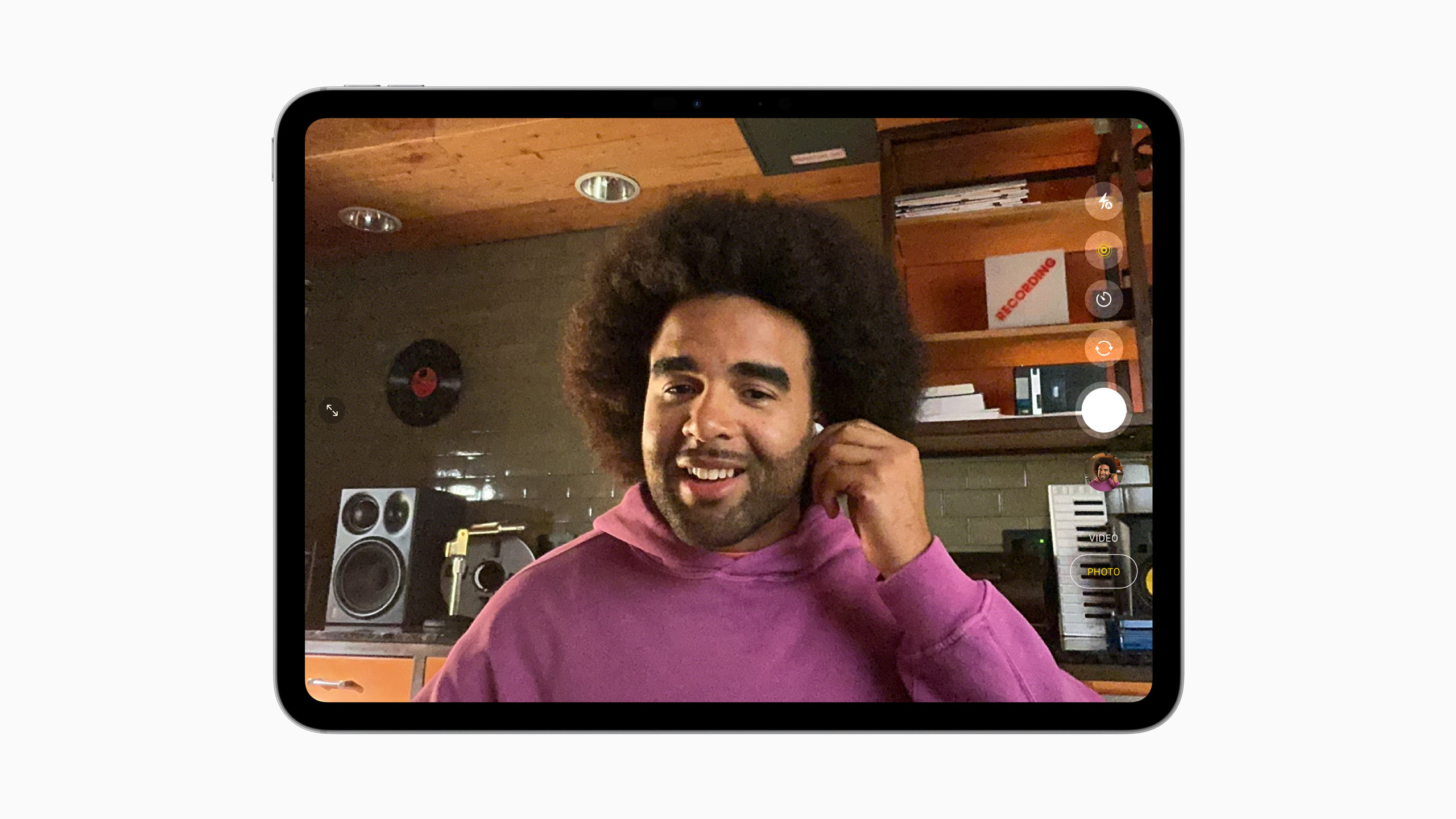 Apple AirPods shown at WWDC 2025 announcement for studio-quality audio and camera remote features