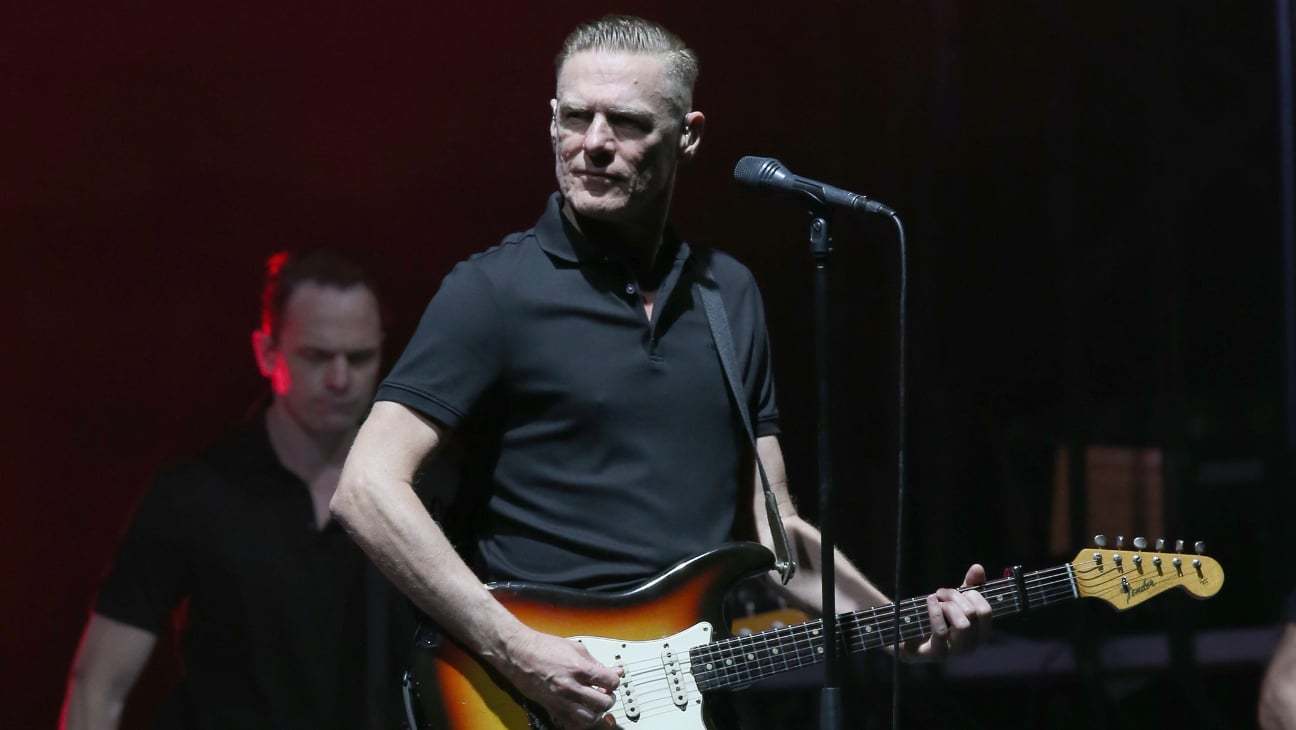 Canadian rock singer Bryan Adams performing on stage