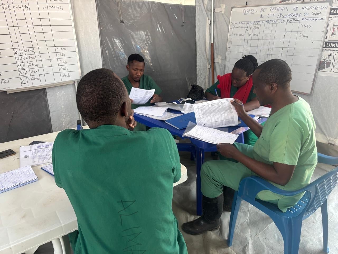 Medical workers at an Ebola Bundibugyo virus disease treatment center in Ituri province Democratic Republic of Congo where the PARTNERS clinical trial has begun