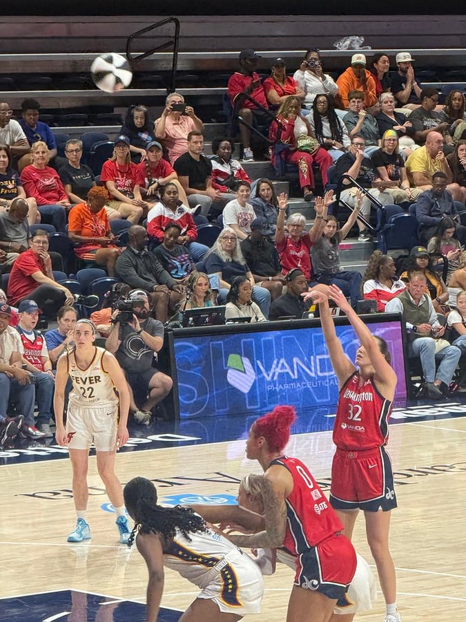 Caitlin Clark on the court at Gainbridge Fieldhouse during an Indiana Fever home game