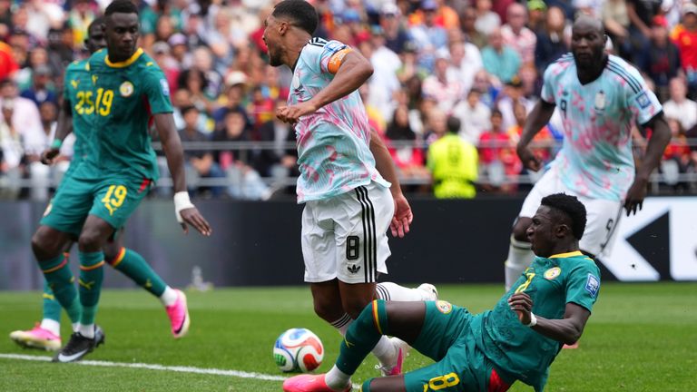Lamine Camara Senegal fouls Youri Tielemans Belgium for the penalty in the 117th minute World Cup 2026 Seattle Stadium