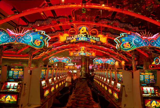 Casino gaming floor with rows of slot machines inside a US casino resort