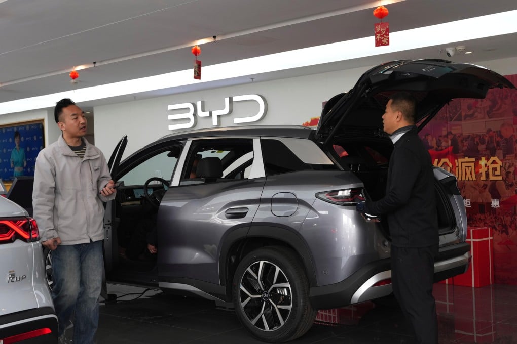 A BYD vehicle displayed at a Beijing showroom as China’s EV market enters a new competitive phase driven by Leapmotor and Zeekr