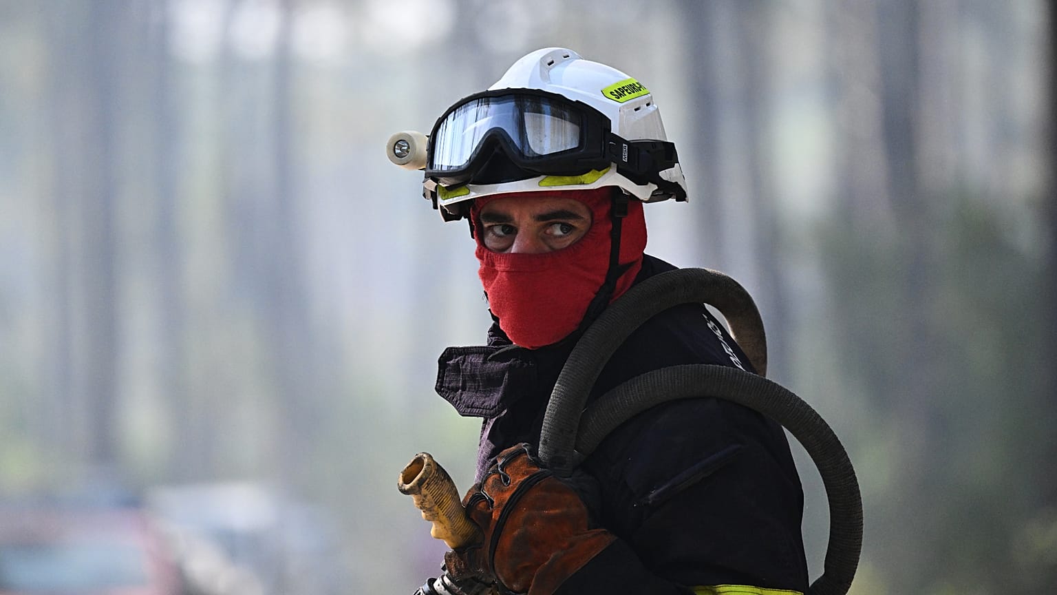 Evacuees leaving their homes in southwest France as wildfires spread amid extreme heatwave conditions