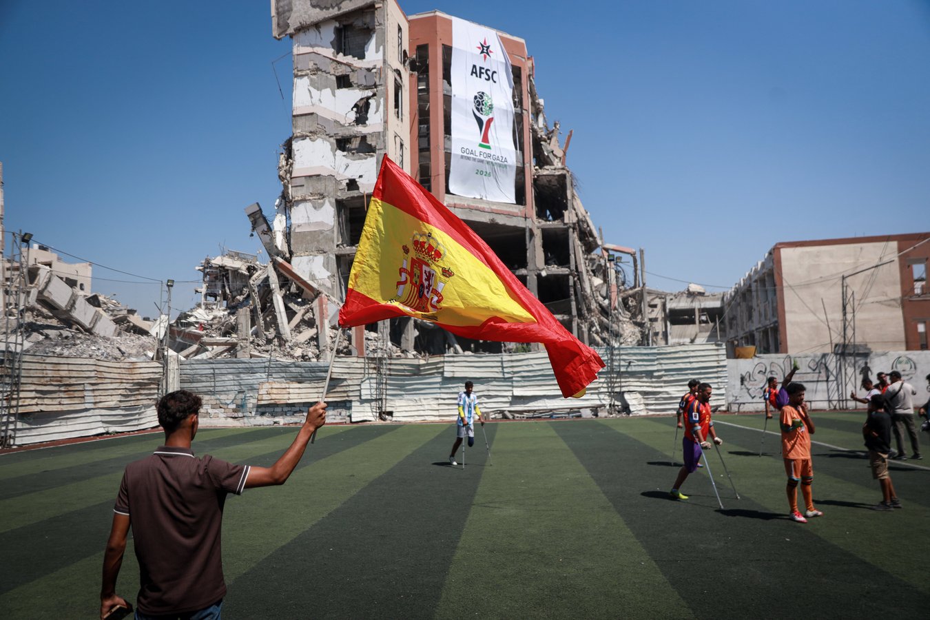Palestinians watching the 2026 FIFA World Cup Final cheering for Spain in Gaza