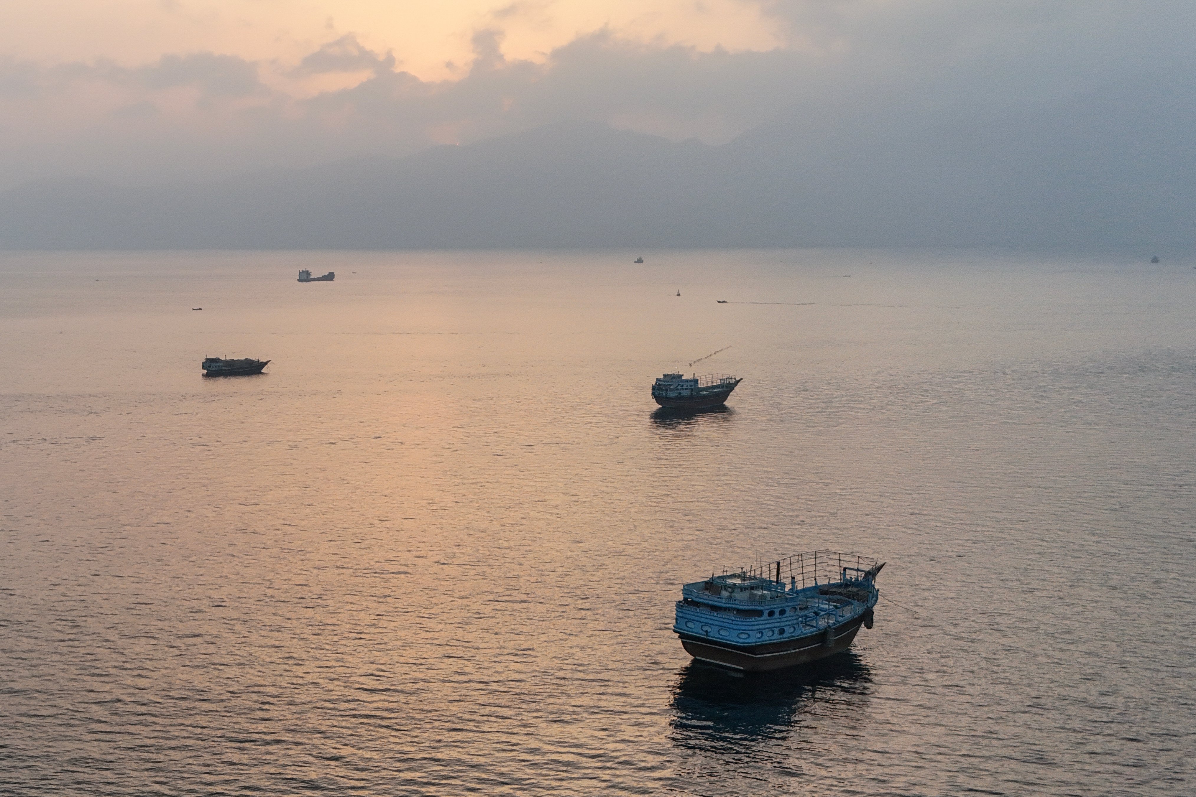 Aerial view of boats anchored off Musandam peninsula near the Strait of Hormuz, June 27 2026