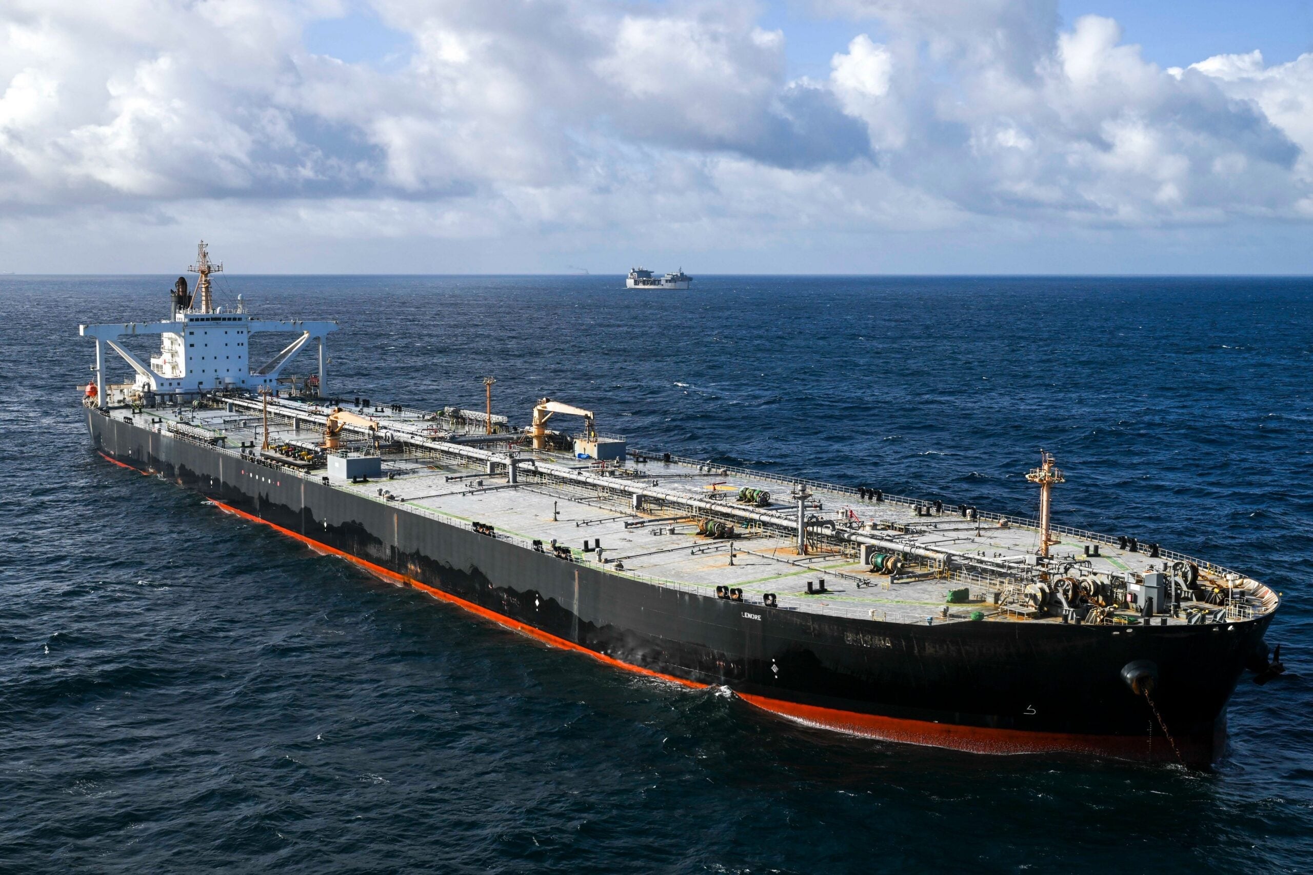 Sanctioned tanker transiting Strait of Hormuz amid Iran UNCLOS service fee dispute 2026