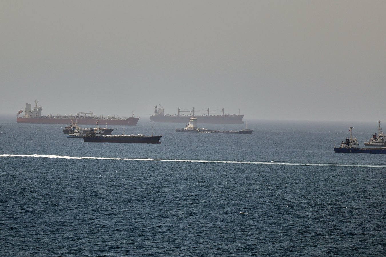 Oil tankers navigating the Gulf of Oman as US strikes on Iran enter their 11th consecutive night
