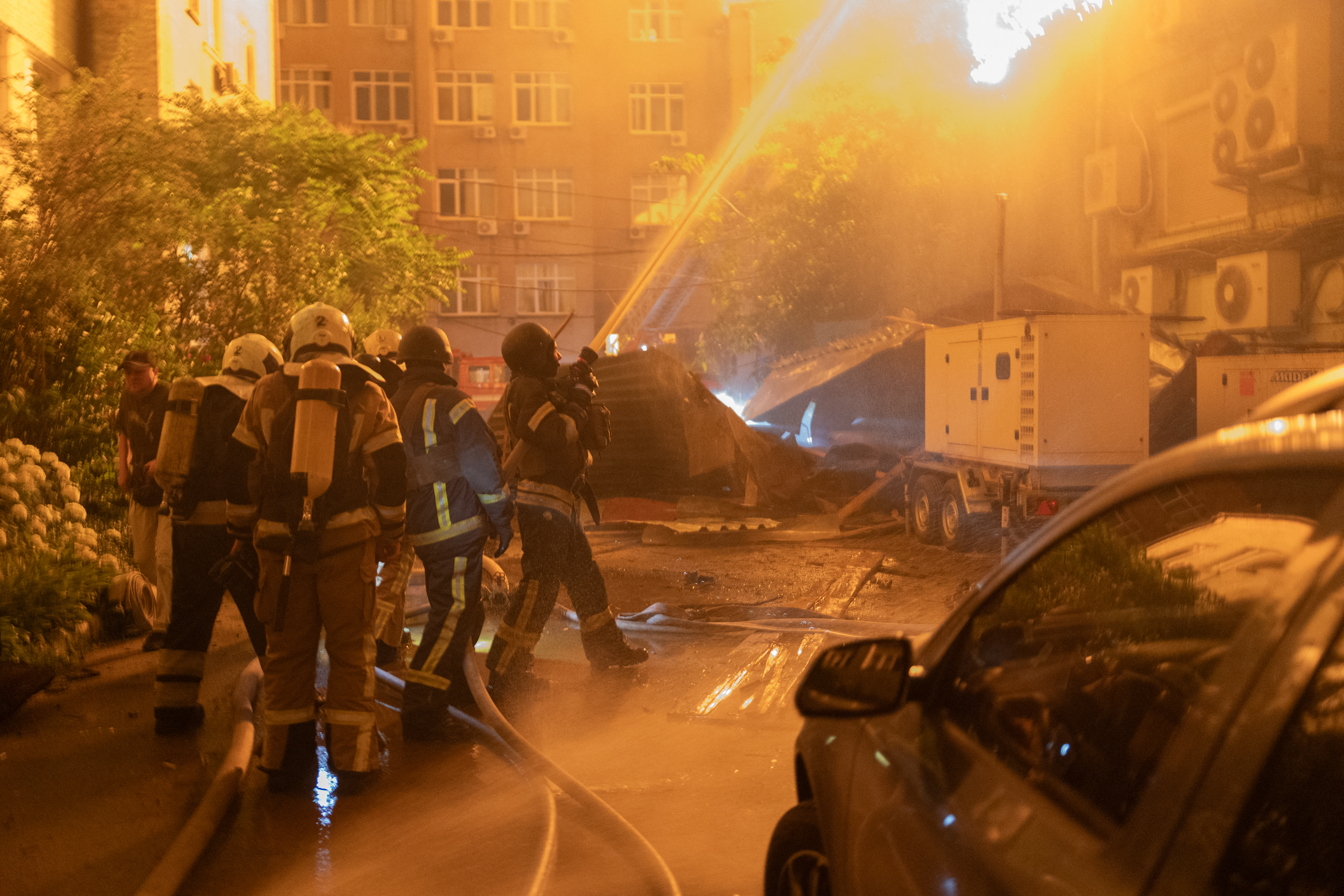 Explosion from a drone striking a building in Kyiv as firefighters battle fires during the July 2 Russian strike